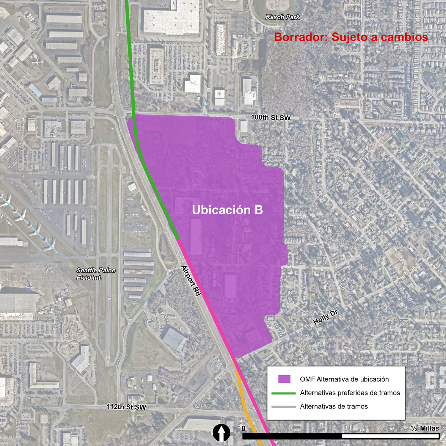 La ubicación de la OMF Site E se ilustra con una figura púrpura. Los límites de la OMF Site E son Airport Road al oeste y 100th Street Southwest al norte.