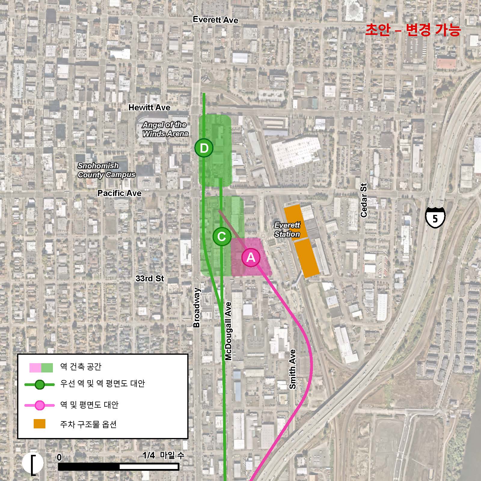 Everett Station(에버렛 역)의 제안된 주차 건물은 베이지색 직사각형 블록으로 표시되어 있으며, Amtrak 서쪽 지역에 있는 기존의 Everett Amtrak Station과 인접합니다. EVT-A와 EVT-1 대안은 둘 다 분홍색으로 보여집니다. EVT-1 고가 경로는 기존의 Amtrak 기차 선로를 따라 북쪽으로 달리다가 기존의 Everett Amtrak Station 근처에서 끝나게 됩니다. EVT-2 및 EVT-3 대안 경로 및 EVT-C와 EVT-D 대안 역은 모두 초록색으로 표시되며, 초록색은 선호 대안임을 나타냅니다. EVT-2 고가 경로는 McDougall Avenue의 서쪽을 따라 시내로 진입하며 북쪽으로 달리다가 Paficif Avenue 북쪽에서 끝나게 됩니다. EVT-3 대안 경로는 EVT-2 경로를 따라 Everett 시내로 향하지만 Broadway로 좌회전하며, 여기서 Broadway 동쪽으로 이어지다가 Hewitt Avenue 북쪽에서 끝납니다. EVT-C 대안 역은 EVT-2 대안 경로를 따라 초록색 동그라미로 표시되며 McDougall Avenue와 32nd Street의 교차점에 위치합니다. EVT-D 대안 역은 Broadway와 Wall Street 교차로에 위치한 EVT-3 경로를 따라 초록 동그라미로 표시됩니다.