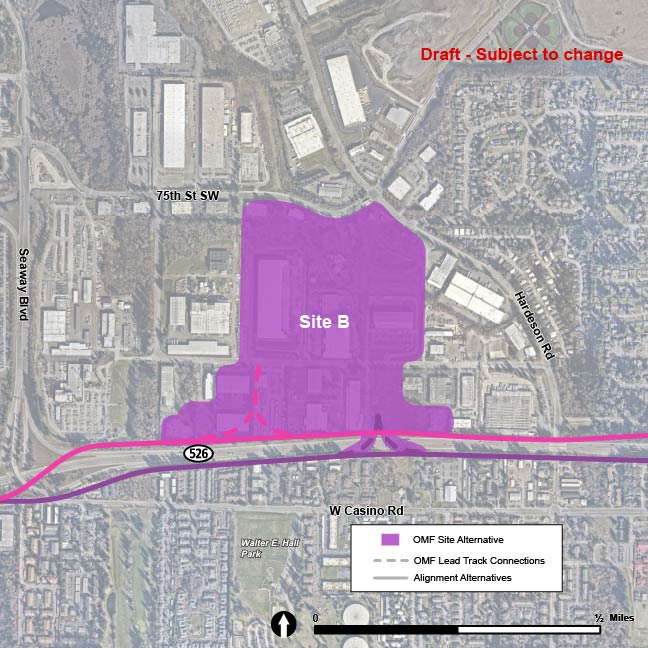 OMF Site B’s location is illustrated with a purple shape. The boundaries of OMF Site B are State Route 526 to the south, 75th Street Southwest and Hardeson Road to the north, and between existing industrial properties to the east and west. Lead tracks, which allow the trains to enter and exit OMF Site B, are shown with dotted lines. 