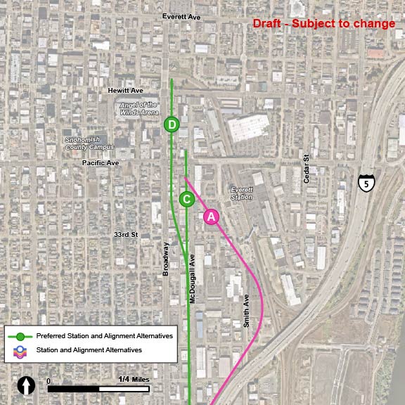 Along the EVT-1, EVT-2, and EVT-3 route alternatives, there are three station alternatives: EVT-A, EVT-C, and EVT-D. The EVT-A station alternative is located along the EVT-1 route alternative, which follows I-5 towards the north and veers to the west towards Everett Station. The EVT-A station is located west of the existing Everett Station. The EVT-C station alternative is located along the EVT-2 route alternative, which follows McDougall to the north. The EVT-C station is located along McDougall Avenue just south of Pacific Avenue. The EVT-D station alternative is located along the EVT-3 route alternative, which would run north on McDougall Avenue and shift west at 34th Street to run along Broadway. The EVT-D station is located along Broadway just north of Pacific Avenue. 